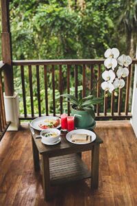 breakfast-outdoor-on-wooden-terrace-with-jungle-vi-2021-08-31-11-58-10-utc-copy.jpg